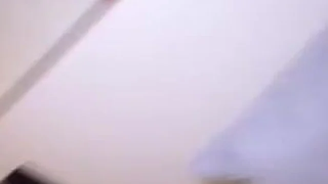 Hanna Miller Teases Her Wet Pussy While Lying On The Bed