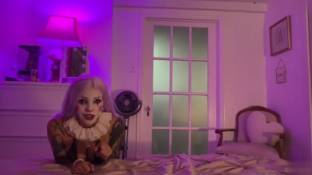 BabyFooji Plays With Her Vibrating Dildo As A Sexy Clown